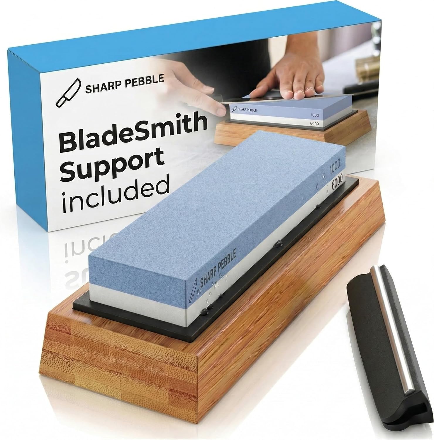 The Sharp Pebble 1000/6000 grit whetstone knife sharpener with a bamboo base,
